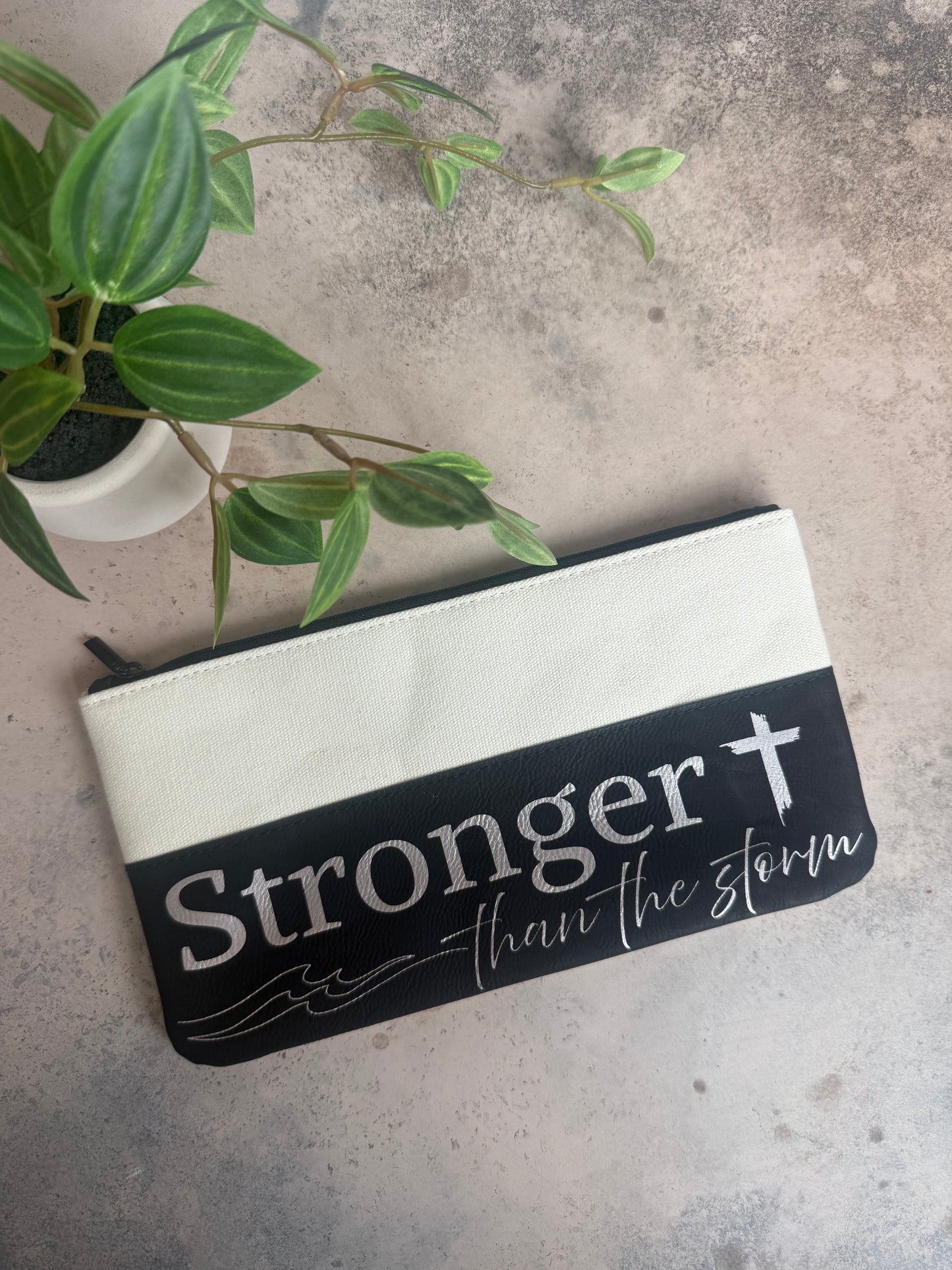 “Stronger Than the Storm” Black Canvas & Leatherette Zipper Pouch