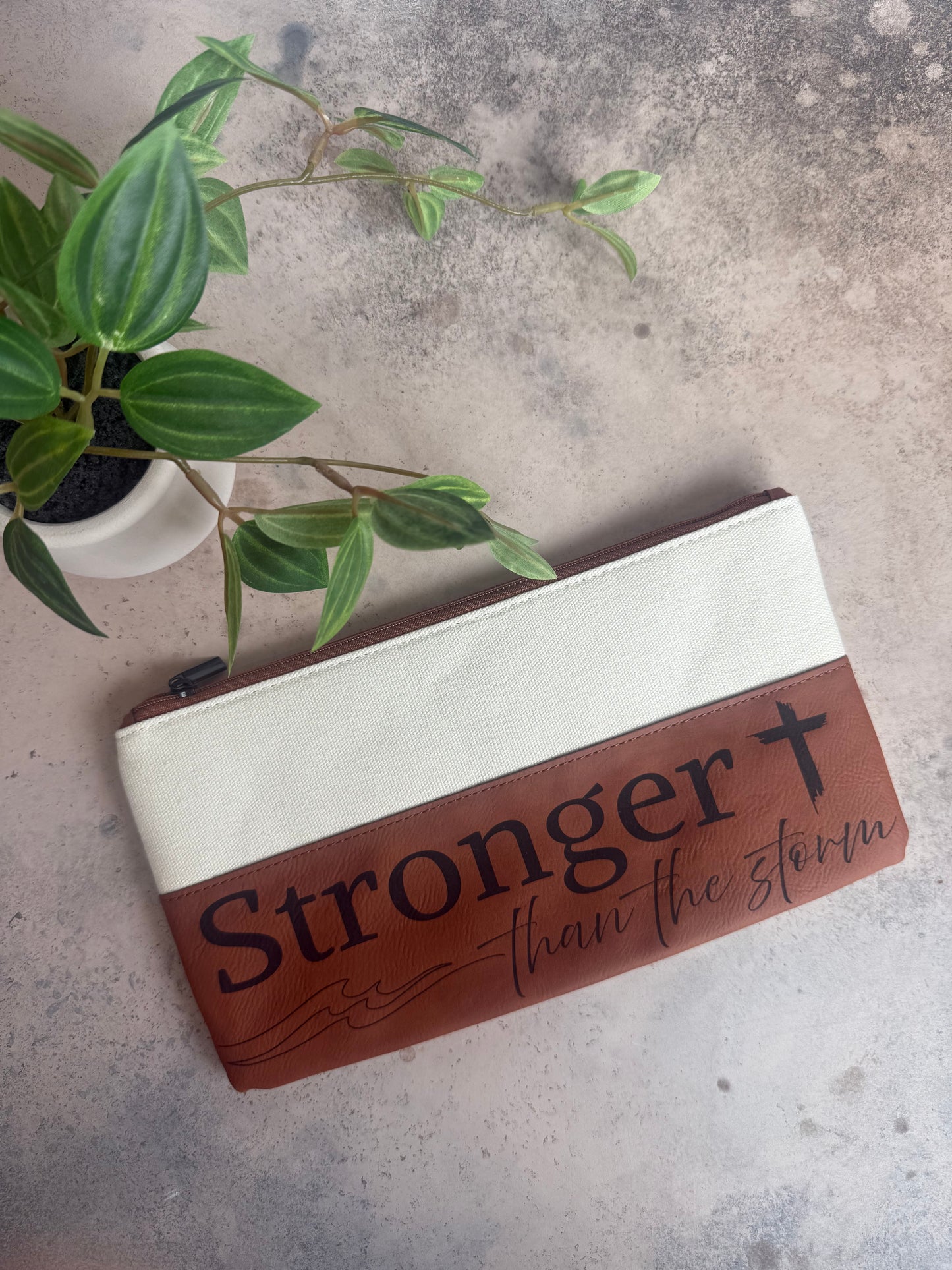 “Stronger Than the Storm” Canvas & Leatherette Zipper Pouch